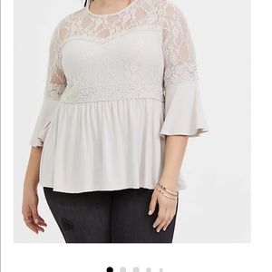 Torrid Ivory and lacy bell sleeve blouse